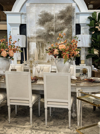 Dining room setup with a table, chairs, and decorative elements. Burlington ON