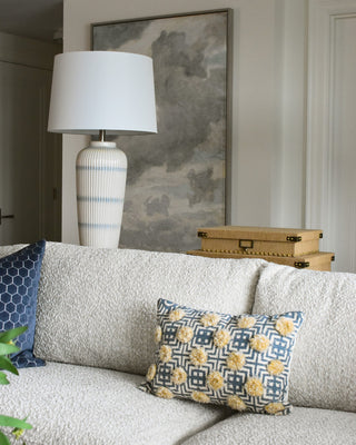 A bright room showing off decor and furniture.
